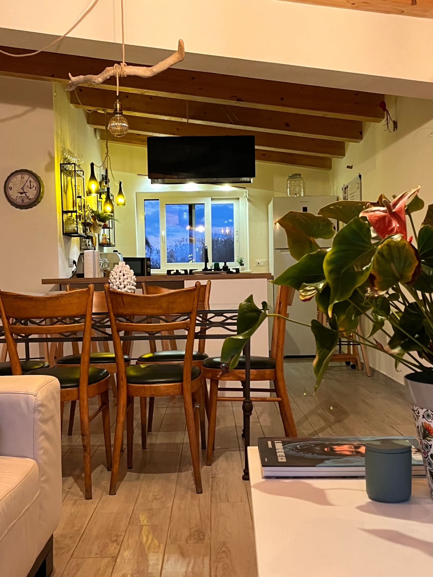Sea view living room at The Blue Window Sicily apartment, with wide bright windows
